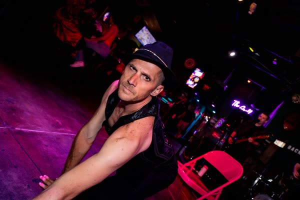 Live, in a fedora